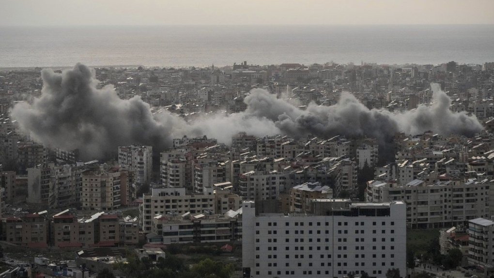 hezbollah launches rocket barrage into israel following idf strikes on command centers in beirut 1