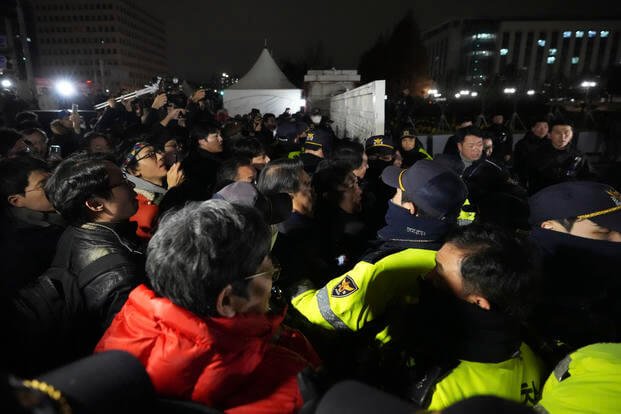 south korean president ends martial law following lawmakers rejection 1