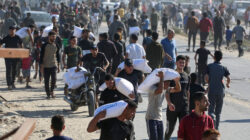 Escalating Tensions: Israel Denies Firing on Palestinians at Gaza Aid Site