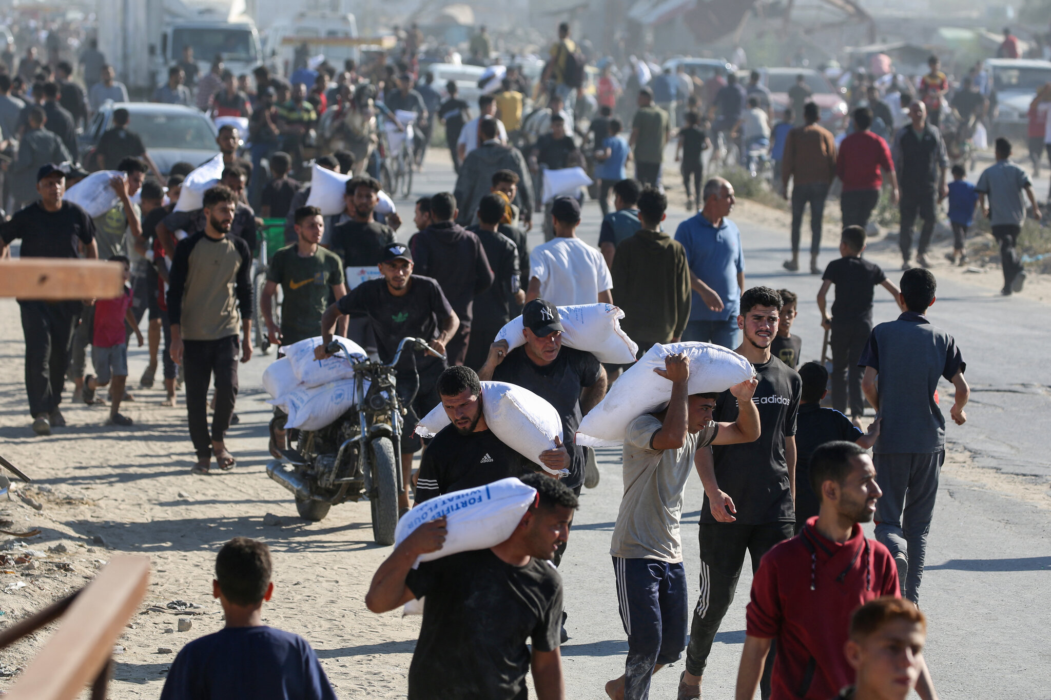 Escalating Tensions: Israel Denies Firing on Palestinians at Gaza Aid Site